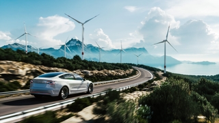 Electric vehicle on a mountain road in Canada