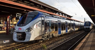 SNCF train running on tracks in France, a symbol of electric and sustainable mobility