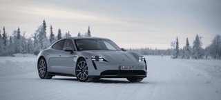 electric car driving in the snow